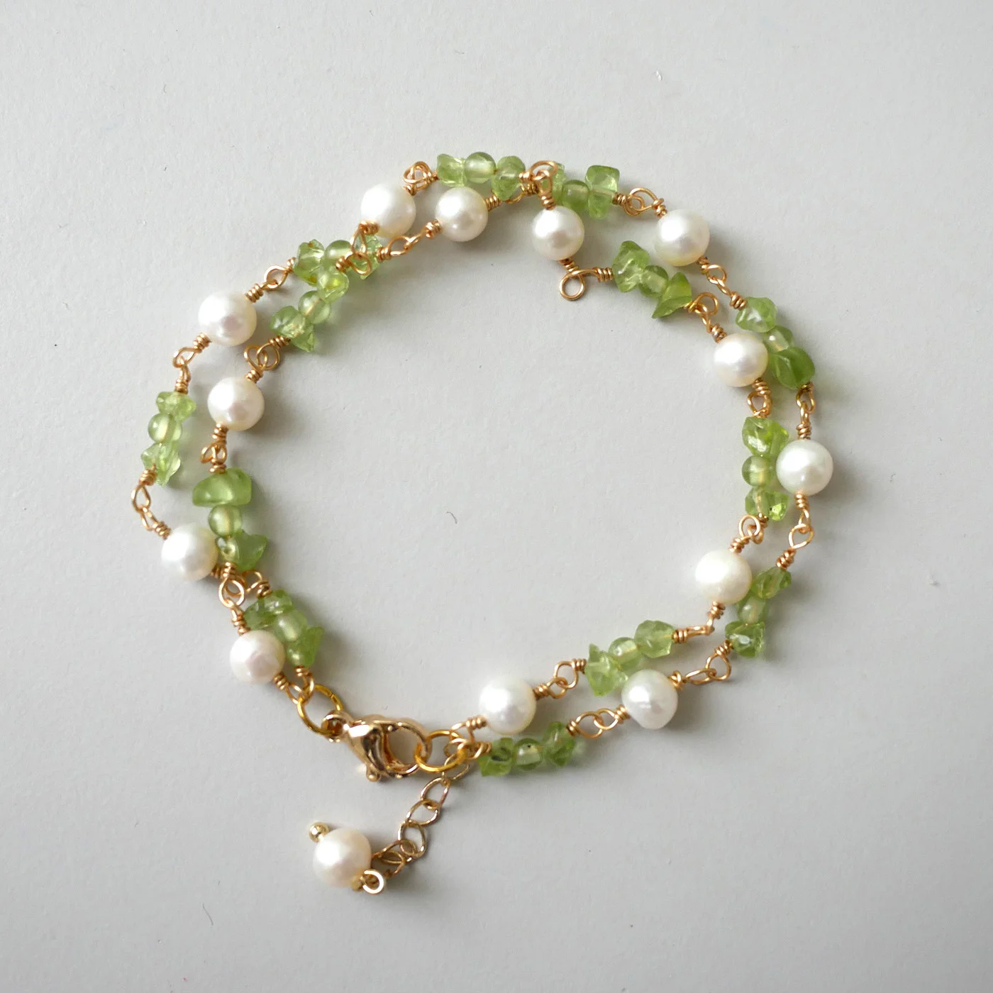 Emerald Mist Bracelet (Olive green peridot, freshwater pearl, 18K gold-filled) — handmade freshwater pearl bracelet by Ollie Pearls Bergen, Norway