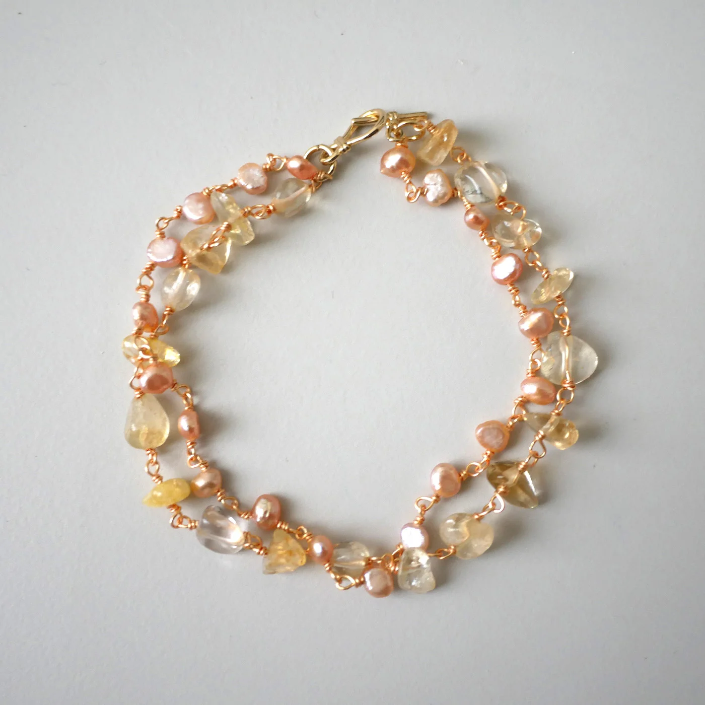 Sunlit Pearl Cascade (Citrine, coral freshwater pearl, 18k gold filled) — handmade freshwater pearl bracelet by Ollie Pearls Bergen, Norway
